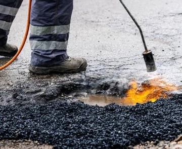 Long lasting pothole repairs by Chattahoochee Valley Sealcoating for Newnan, Georgia