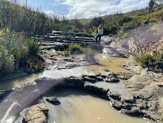 Cloudy silt laden water of the Tufa fFow, Kangaroo Island after bushfires 2020