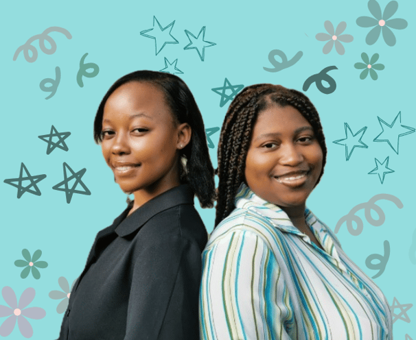 two female entrepreneurs standing next to each other in front of a branded background