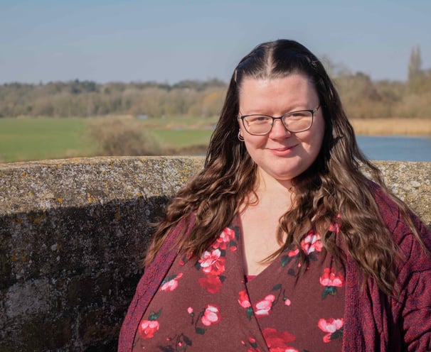 kate-accounts-manager-at-artful-accountancy-wearing-a-dress-and-cardigan-head-and-shoulders-standing