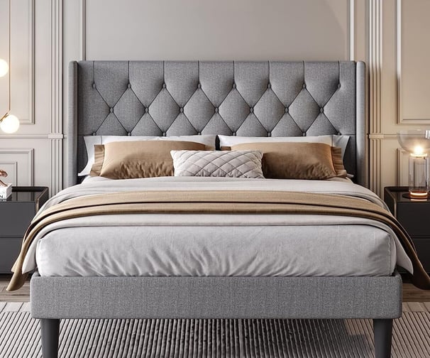 grey bed frame with grey and nude comforter
