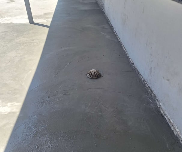 Specialized waterproofing screeded to a fall towards drainage system, Harbor Bay Mall, Cape Town, False Bay