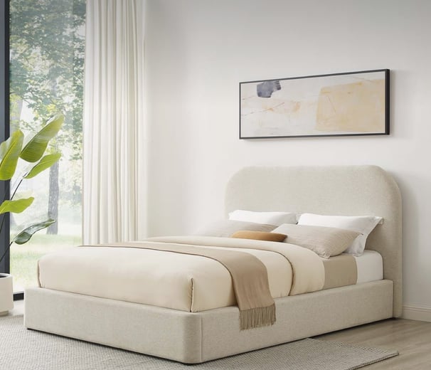cream queen bed frame with natural light bedroom