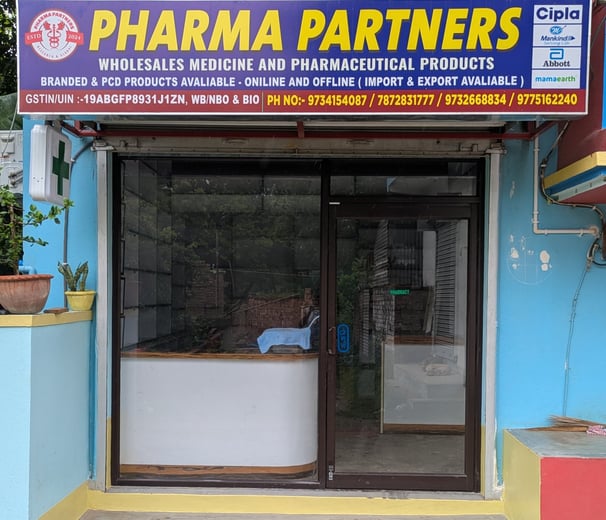 a pharmacy office building with a pharmacy office sign