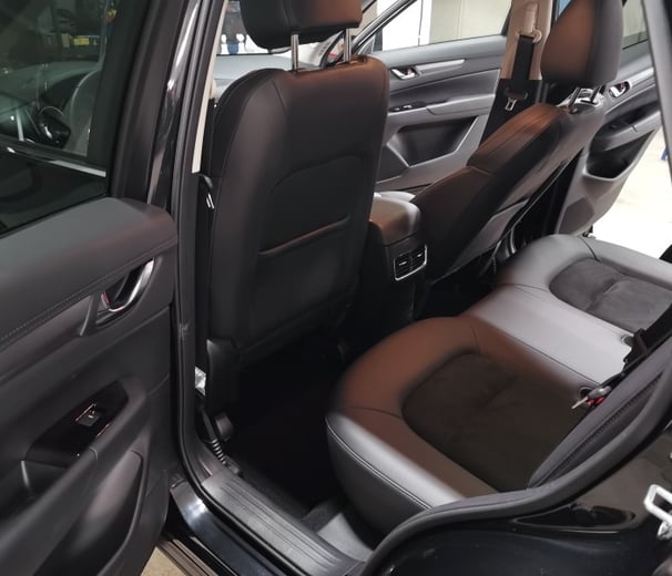 Interior Detailing Image “Deep interior car detailing with steam cleaning and vacuuming of seats"