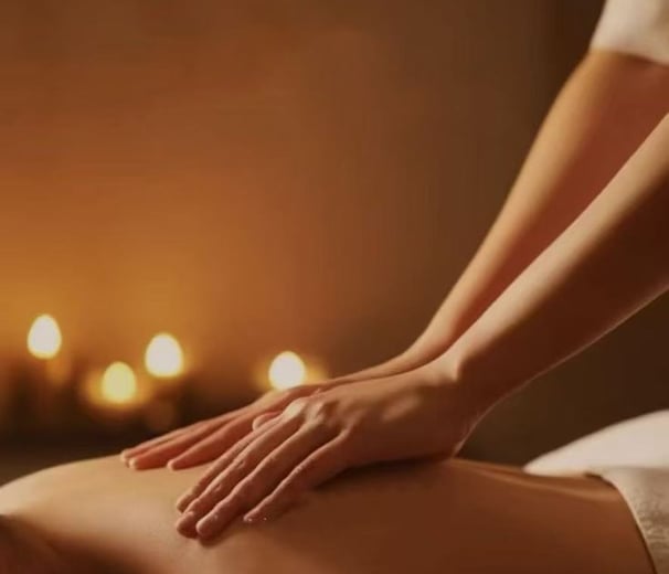 a woman getting a massage at a spa