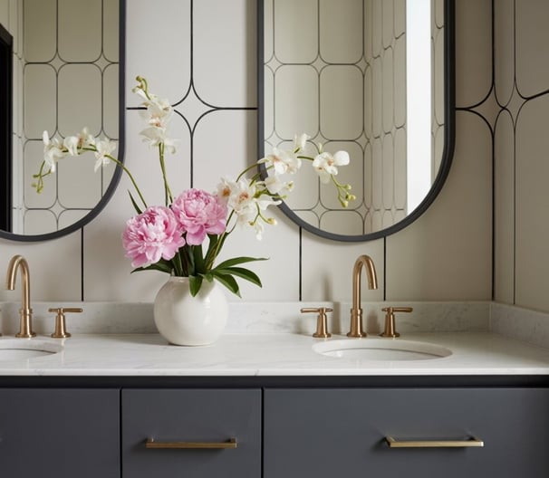 a bathroom with two sinks and two mirrors