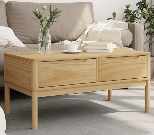 pine coffee table with cream colored couch