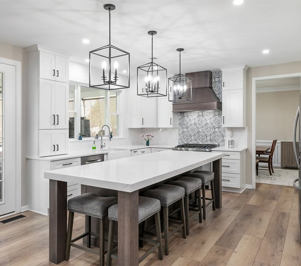 "Custom kitchen renovation with island and tile backsplash in Cumming Georgia"