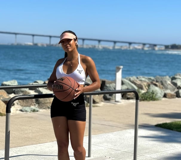 Women's KF black booty short and white women's strapped sports bra