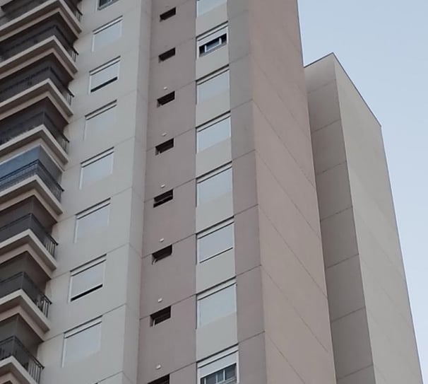 Fachada de prédio residencial representando imóvel regularizado