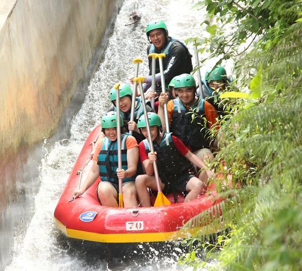 Tourists enjoying thrilling white water rafting in Ubud, Bali – perfect adventure for travelers