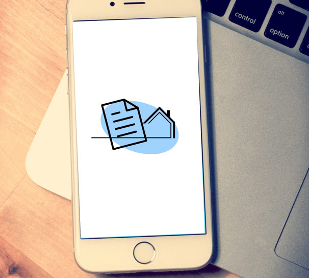 a cell phone with a paper clipping on it