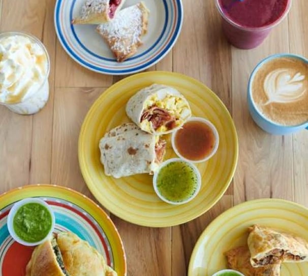 a spread showcasing our best selling coffee's, smoothies, frappes, empanadas, and burritos