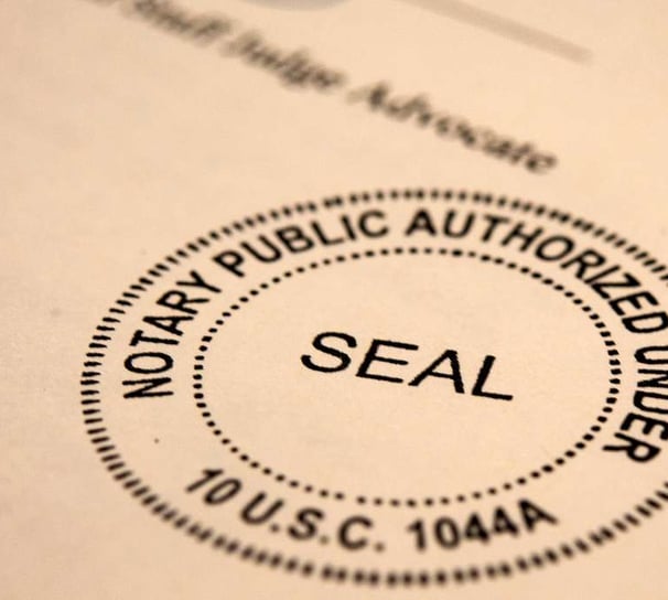 mobile notary signing document in Broomfield