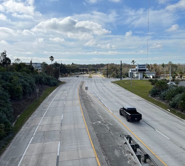 a truck driving down a highway 