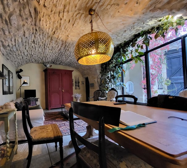 a dining room with a table and chairs