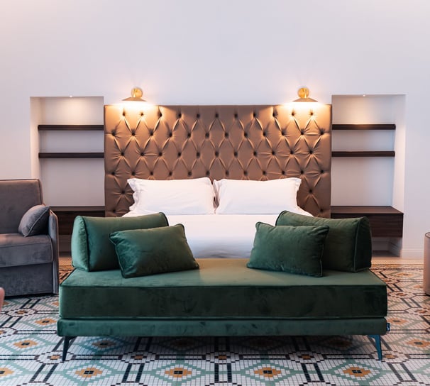 a bed with a couch and a couch