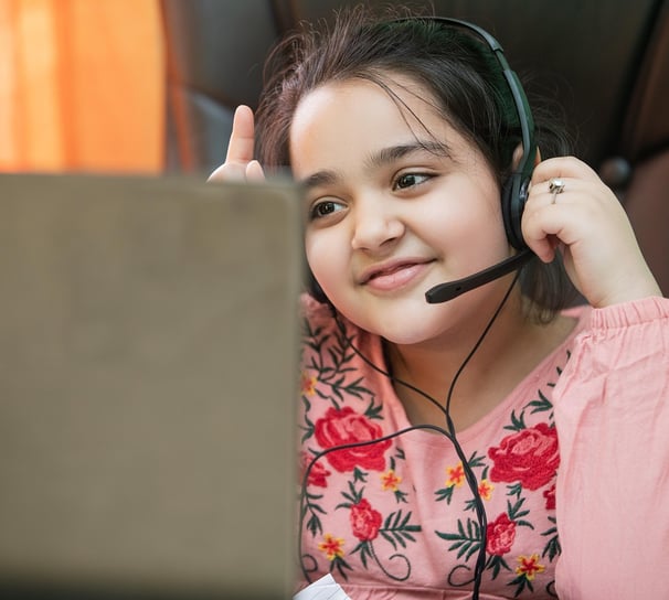 a girl with headphones and a headset on her headphones