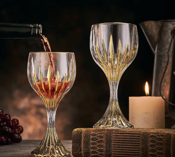 Crystal glasses cradle wine, gold - kissed charm lingers