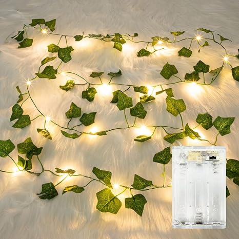 a white light bulb string lights up in a room