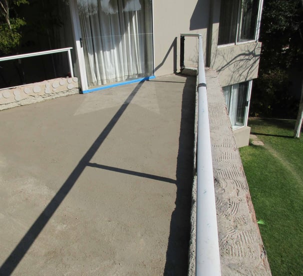Screed in state of cure at bedroom sliding door end. Fourways Gardens, Sandton