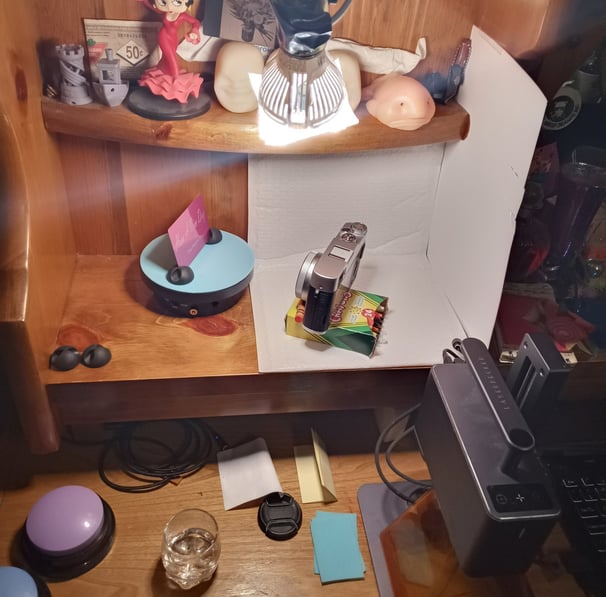 The full kit - the "photo booth" fit into a section of dresser, shot of gin, laser burner.