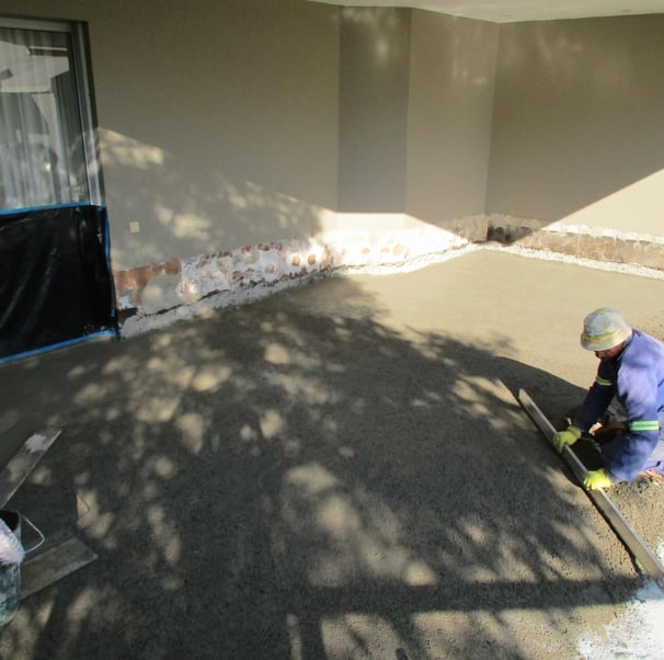 Screeding balcony to an adequate fall for water run off, Fourways Gardens, Fourways