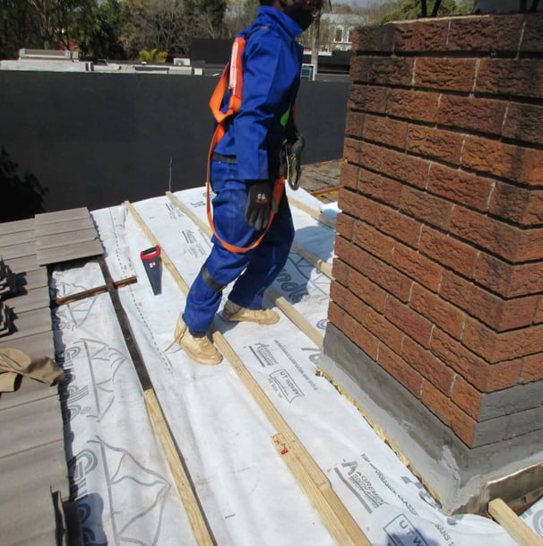 Chimney area precision batten work laying to accommodate new roof tiles, Hyde Park, Sandton
