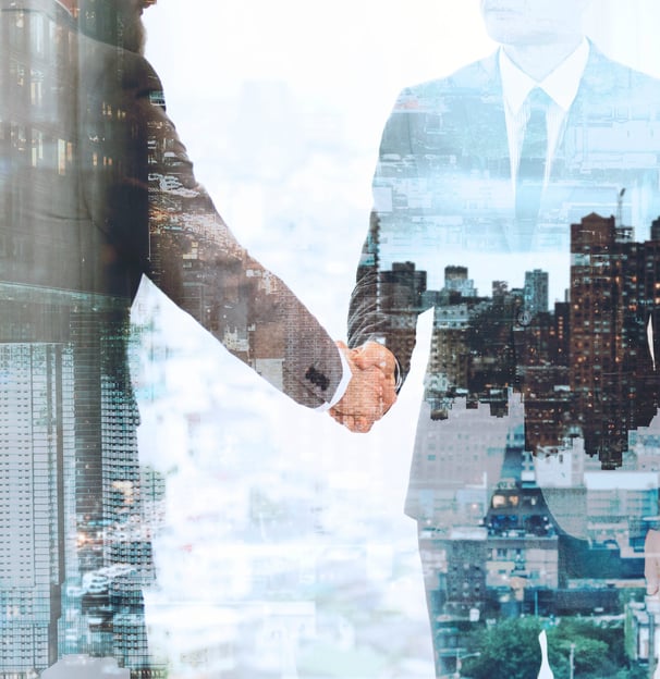 two people shaking hands in front of a cityscapeople