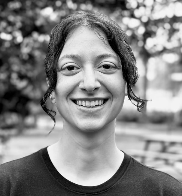 Zeyneb Önsiper Tai Ji Qi Gong instructor of WDP Turkey, smiling outdoors in black shirt