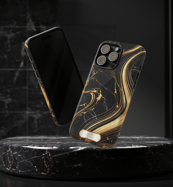 a black and gold marbled phone case with a phone in the middle