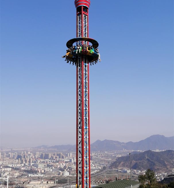 a ferris Rotating tower at a amusement park