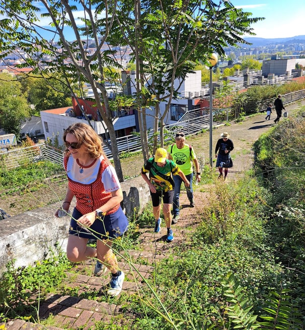 hash people climbing a suburban trail