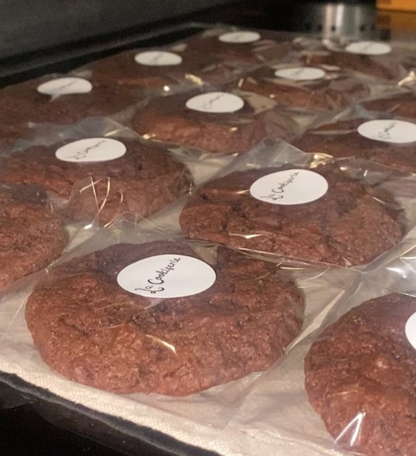 a tray of cookies with labels on them