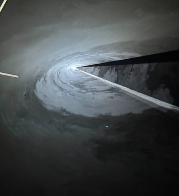 Abstract photo of light beams in a dark room creating a sense of the unknown and movement