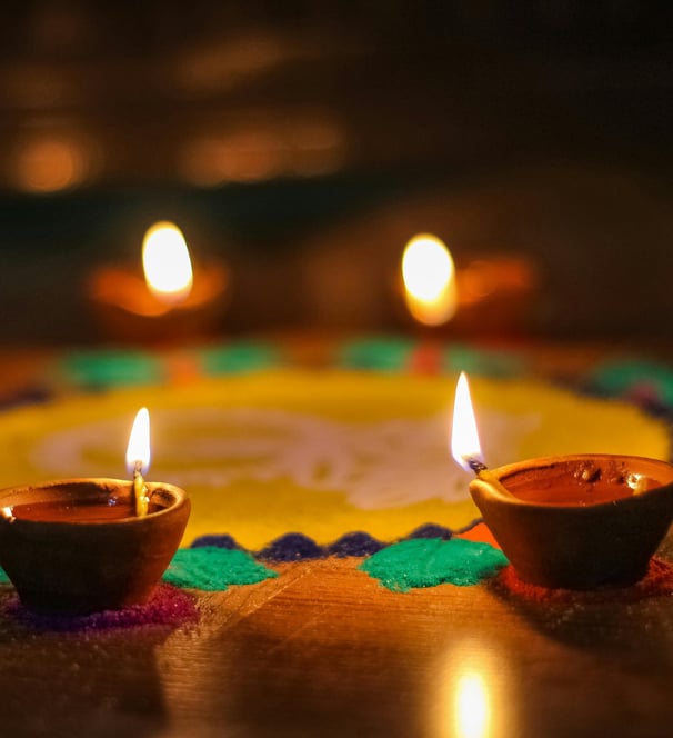 candles burning during meditation and symbolizing sacredness