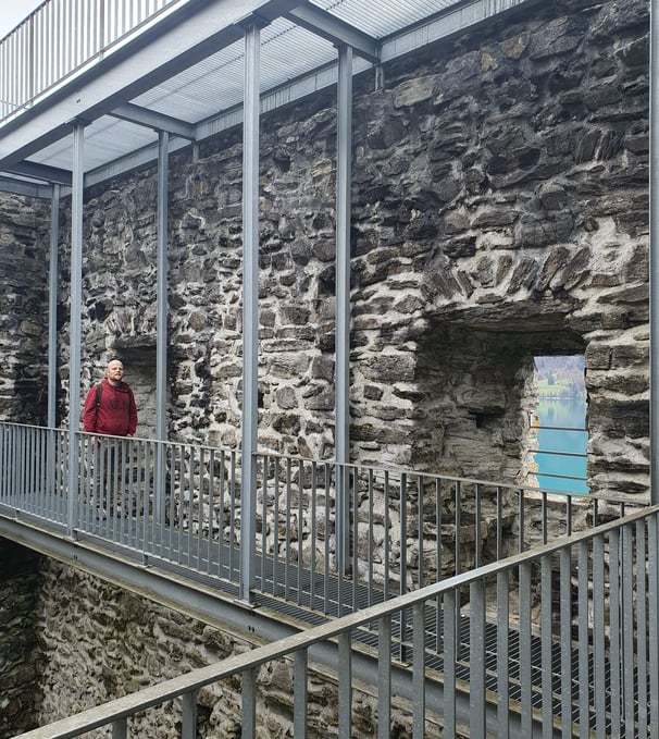 Colin from Hidden Switzerland Travel inside of the Ringgenberg Castle ruins