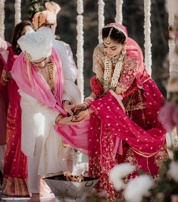 a bride and groomsmid getting married in a ceremony