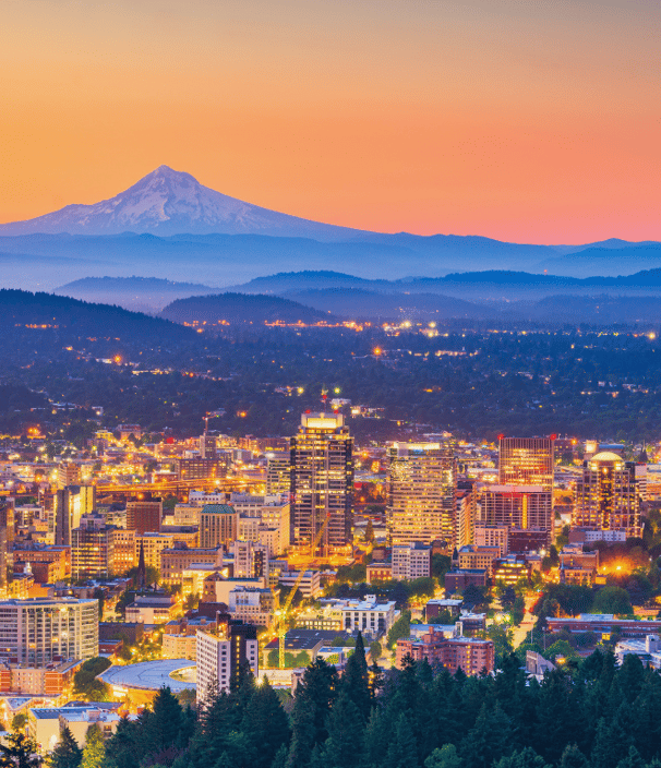 Portland skyline with Mt. Hood, showcasing Platen Media’s reach across Oregon.