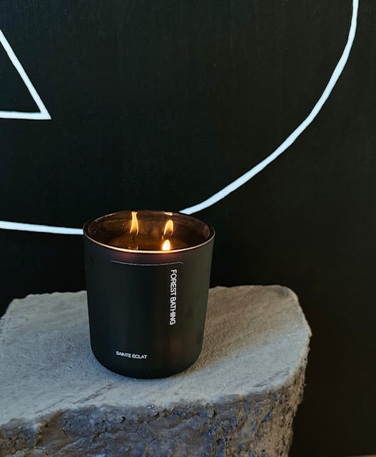 Serene forest bathing candle crafted with natural scents, designed to promote healing & tranquility