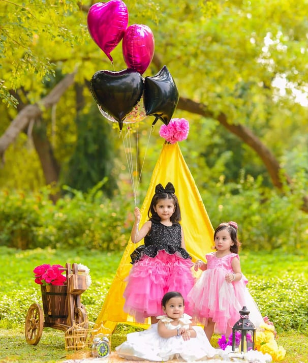 three girls wearing pretty dress