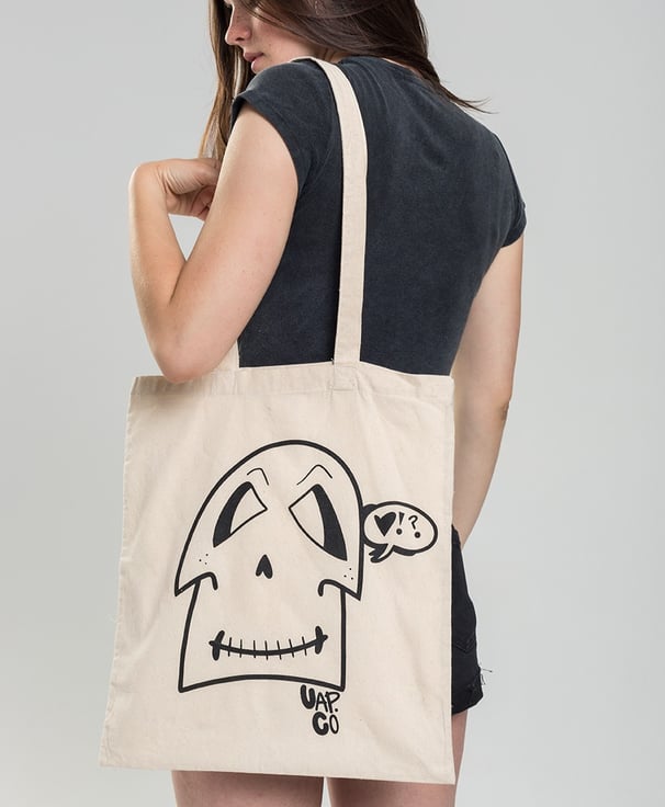 a woman with a tote bag