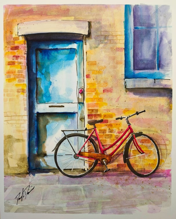 a bicycle parked in front of a building