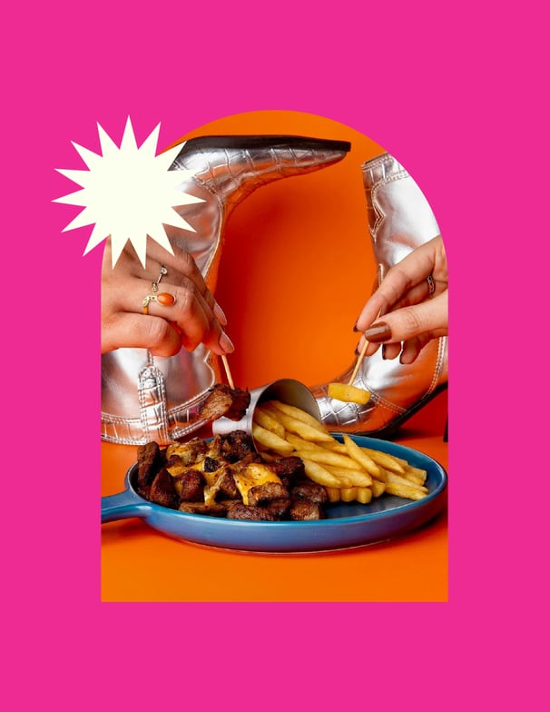 a person holding a plate with food on it