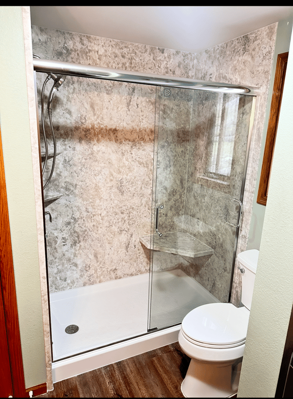 Madison Shower install with bench seat and slider door | EZ Remodeling