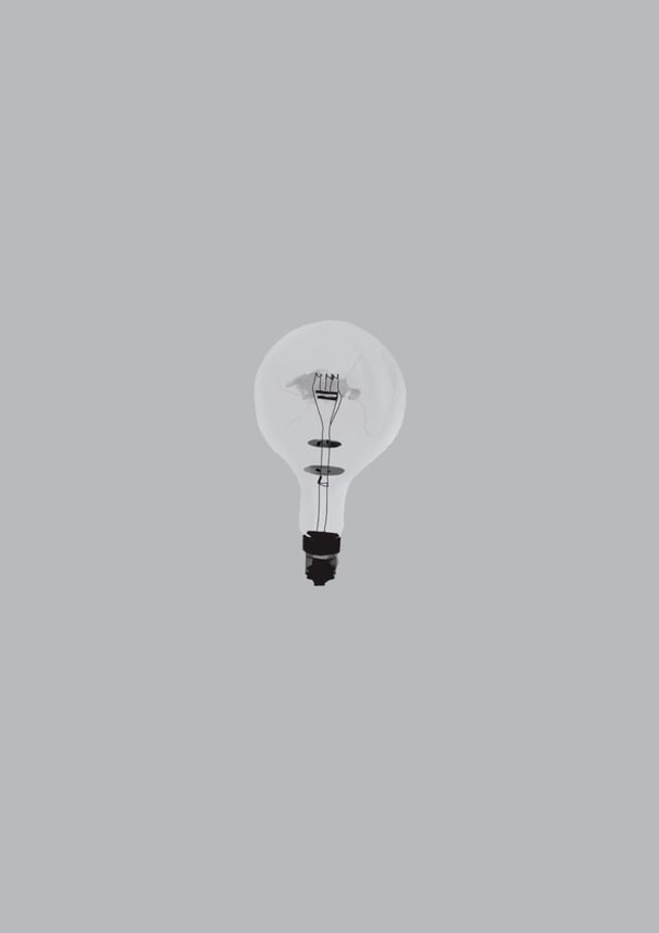 Illustration d’une ampoule en verre éteinte (grillée) sur fond gris.