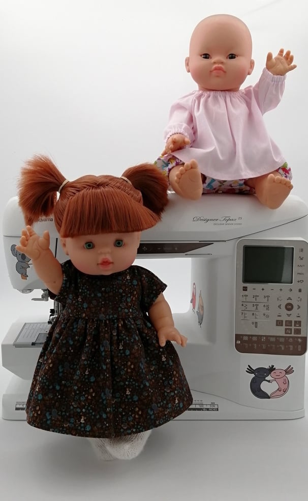 Minikane dolls in handmade clothing