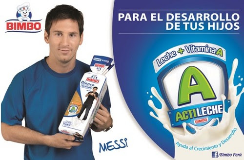 a man holding a box of cereals and milk