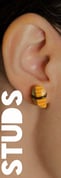 a woman with a sushi earring